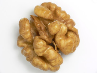 Half of Circassian walnut isolated on the white background