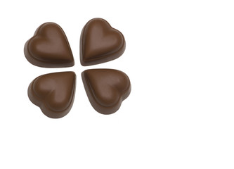 four chocolate hearts on white background