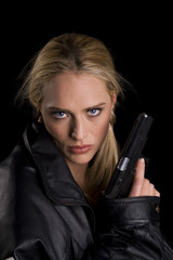 Steely eyed woman woth gun