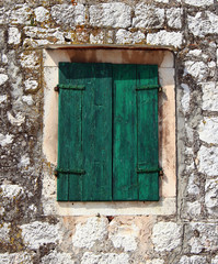 Painted green window blinds