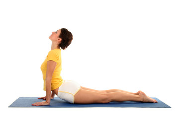 Woman Posing On A Blue Yoga Mat