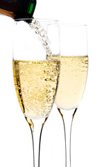 Champagne poured in to the glass (isolated on white background)