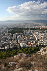 Fototapeta na wymiar Athens general view from above. Rock, buildings and streets. 