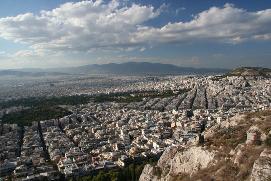 Athens general view from above. Rock, buildings and streets. 