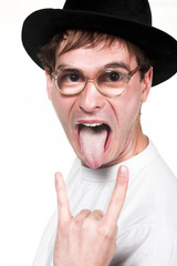 man in hat and glasses with clapper