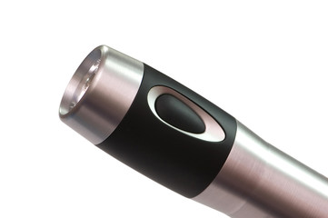 Shiny flashlight isolated on the white background