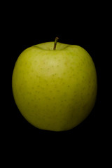 Green apple isolated on black
