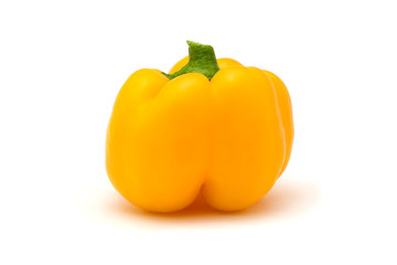 Orange bell pepper isolated on white