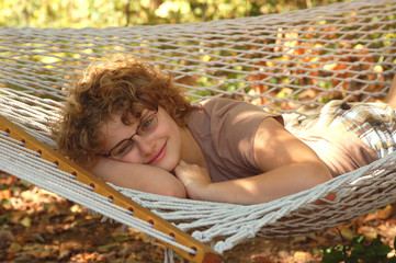 Girl relaxing in hammock