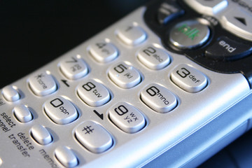 Fototapeta na wymiar Silver cordless telephone keypad