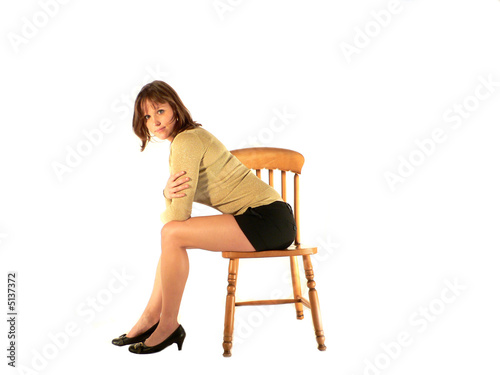 "femme assise sur chaise" photo libre de droits sur la banque d'images