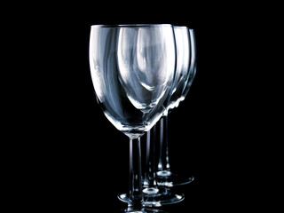 Three Wine Glasses on a black background - night