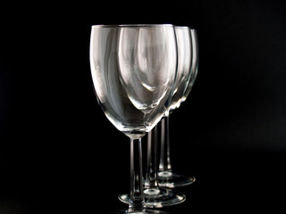 Three Wine Glasses on a black background