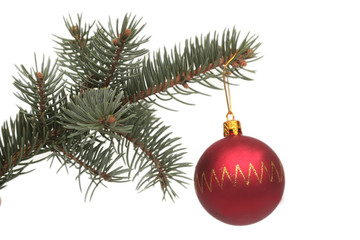 Obraz na płótnie Canvas Red New Year's sphere and pine branch 