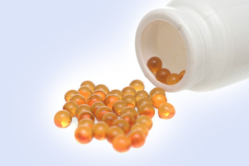 Yellow tablets on a white background