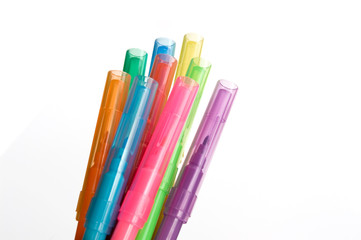 colored pencils on a white background