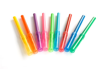 colored pencils on a white background