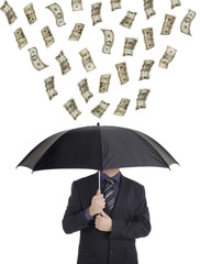 Money raining down on a person with an umbrella