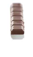 Tile of tasty chocolate on a white background