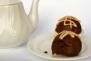 Two brandy balls and teapot