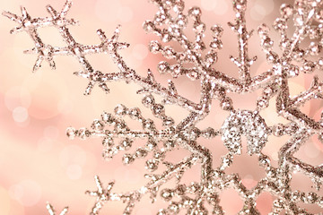 Silver snowflake with pink background