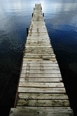 Obraz premium Dock Floating in Blue Water