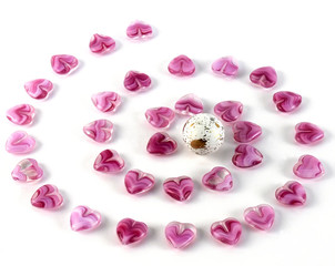 One white bead and spiral pink glass hearts