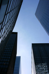 Fototapeta na wymiar Glass skyscrapers in the financial district, New York, vertical