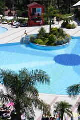 swimming pool at sunny hotel