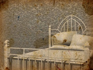 Vintage bed in grunge background