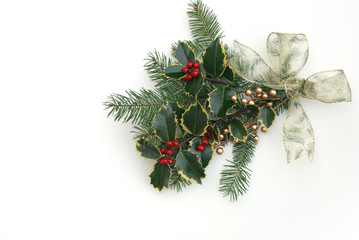 christmas decoration with holly berries on white background