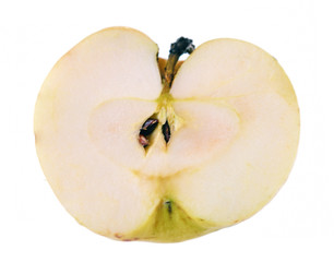 Apple cut in half against white background