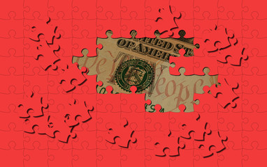 red puzzle pieces cover us money