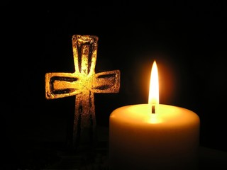 candle light and cross