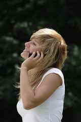 Naklejka premium The girl who was speaking by phone