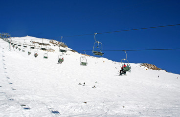Fototapeta na wymiar chairlift in alps