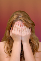 Fototapeta premium Hands covering face