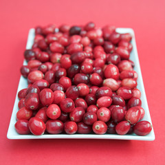 Cranberries on a white plate