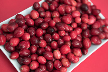 Cranberries on a white plate