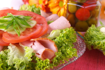 Fresh salad with onion, tomato and basil