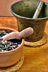 Mortar with bowl with herbs