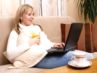 Fototapeta premium Beautiful woman working on her laptop.