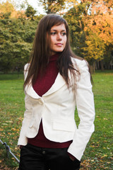 Girl in a park on a sunny autumnday