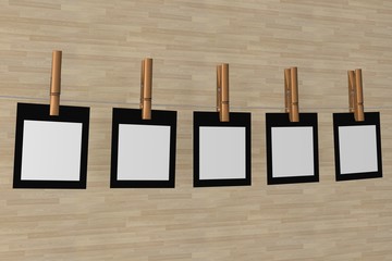 Five sheet of a paper hanging on a cord. 3D image.