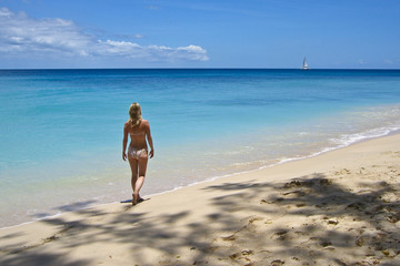 Obraz premium Girl on Caribbean Beach