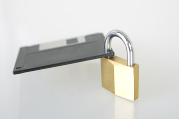 Naklejka premium Vorhängeschloss sichert Diskette