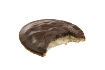 Jaffa cake with bite missing isolated on white