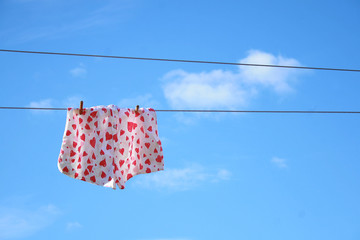 Male kitsch underwear on clothesline