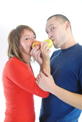 happy couple eating apples
