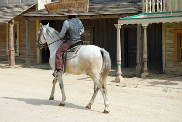 Cowboy in the traditional American western town